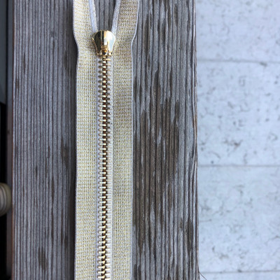 Metal zip gold with lurex tape and non-lock slider fast insert .