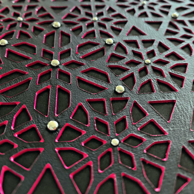 Laser-cut leather panel